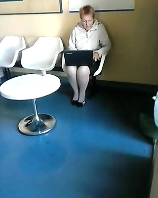 spy sexy mature in pantyhose with laptop