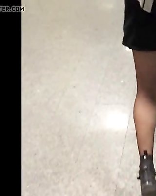  Sexy legs in Black Fishnet Pantyhose Upskirt 